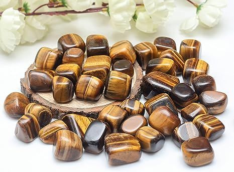 Collection of tumbled tiger's eye stones.