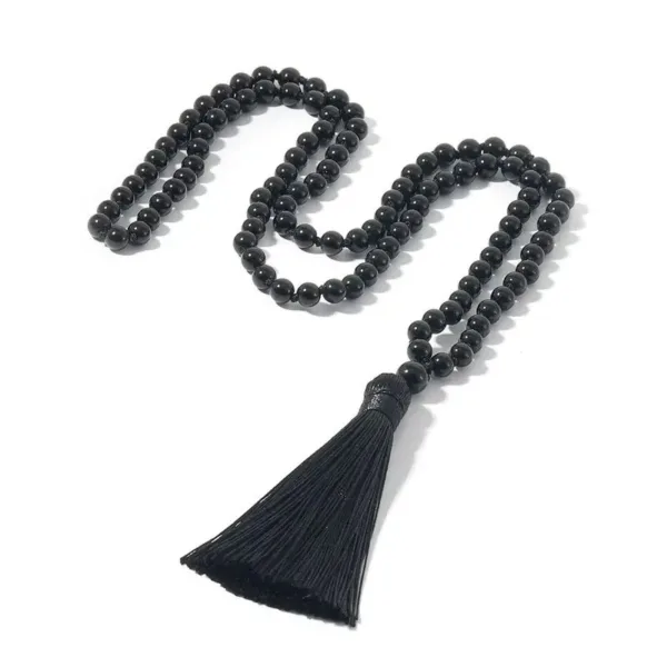 Black beaded necklace with tassel.