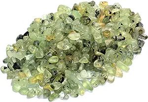 Pile of green and yellow gemstone chips.