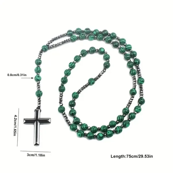 Green and black beaded necklace with cross pendant.