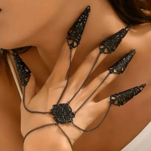 Black lace finger and wrist jewelry.