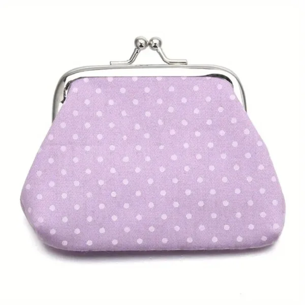 Purple polka dot coin purse with clasp.