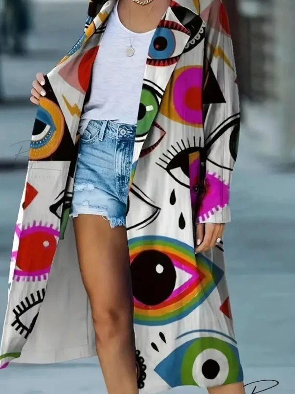 Woman wearing a colorful eye print coat.