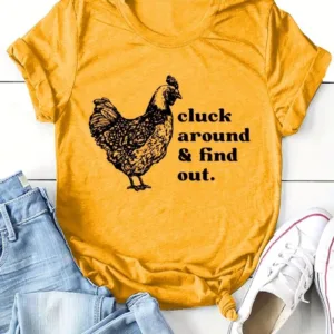 Yellow t-shirt with chicken and saying.