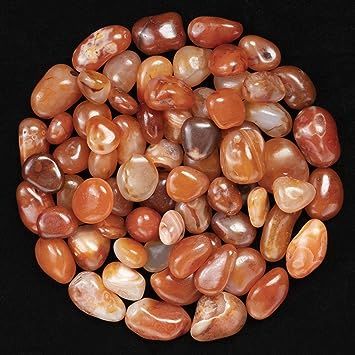 Collection of red carnelian tumbled stones.