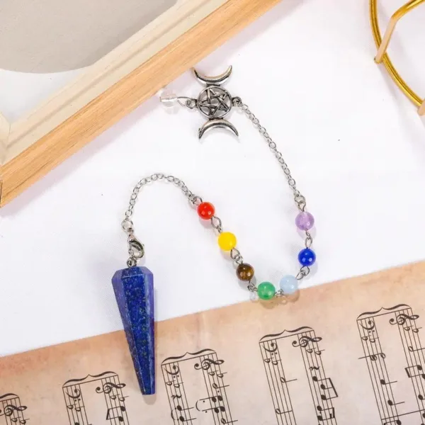 Blue lapis lazuli pendulum with chakra beads.