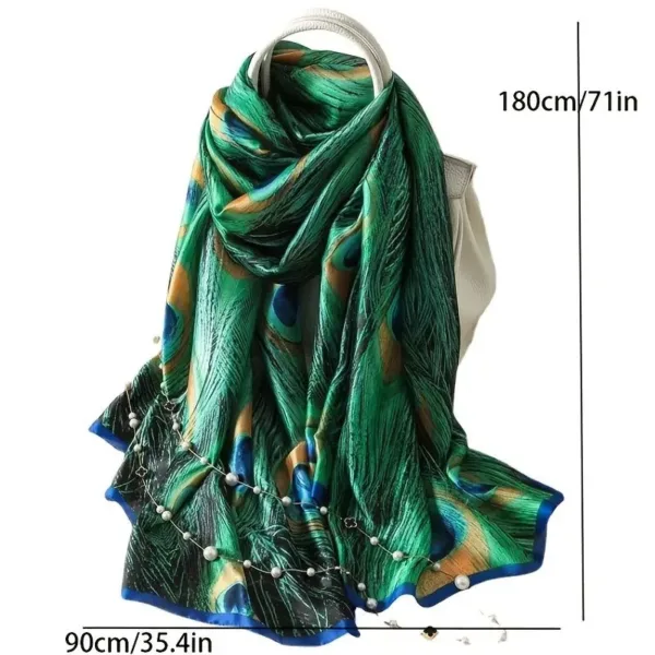 Green peacock feather silk scarf with pearls.