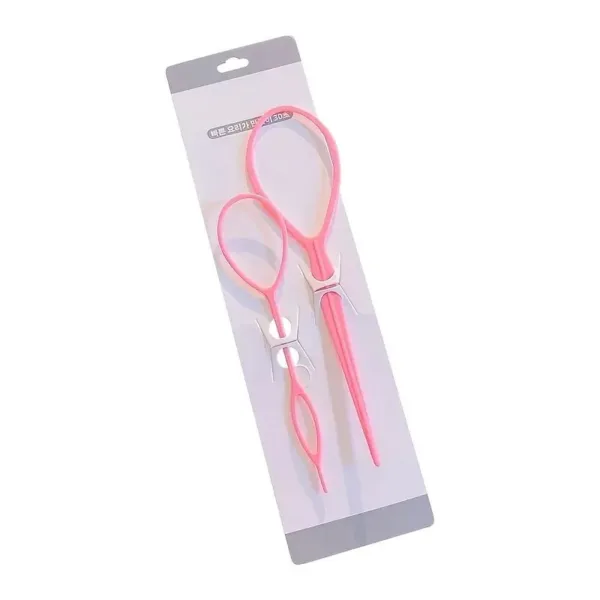 Pink plastic hair bun maker tools.