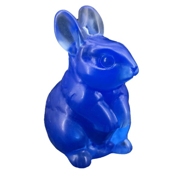 Blue glass figurine of a rabbit.