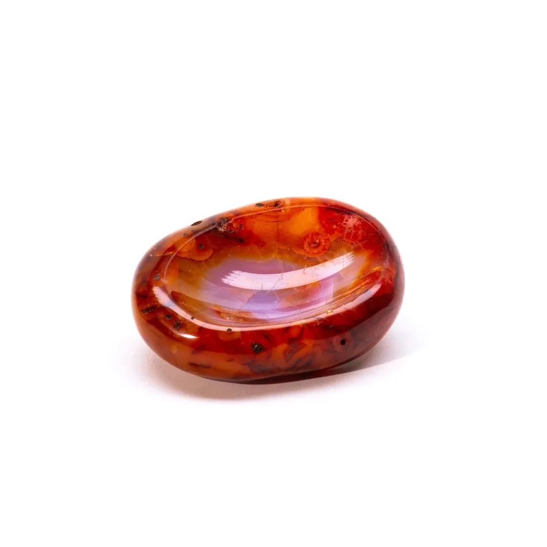 Red carnelian crystal with purple center.