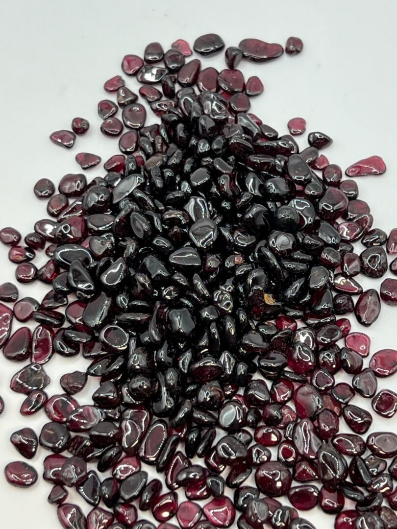 Pile of dark red garnet stones.