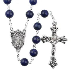 Silver rosary with blue lapis lazuli beads.