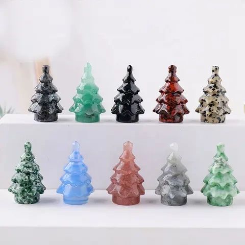 Ten miniature gemstone Christmas trees.