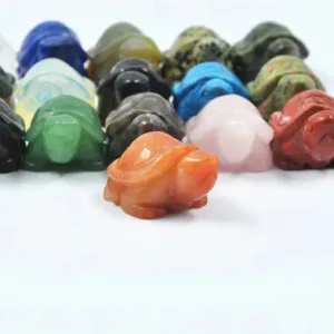 Collection of colorful gemstone turtle figurines.