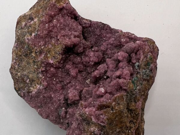 Pink cobalt calcite mineral specimen.