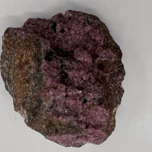 Pink and brown mineral rock sample.