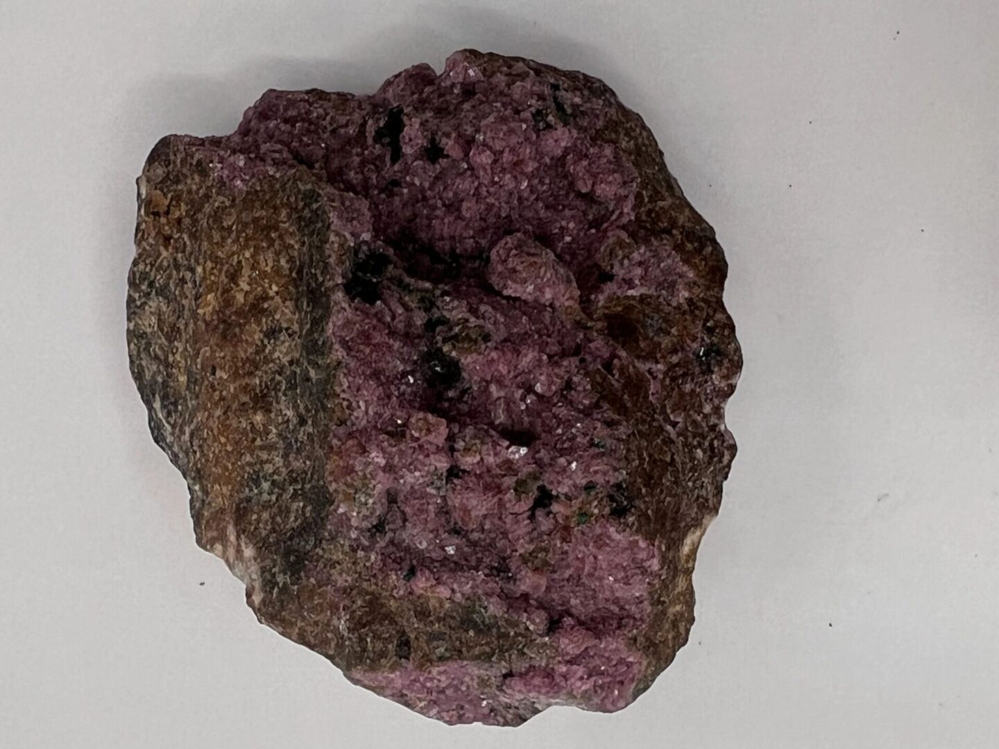 Pink and brown mineral rock sample.