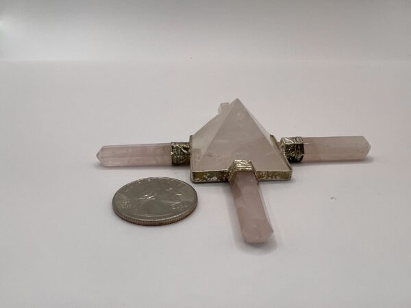 Rose quartz crystal pyramid with wands.