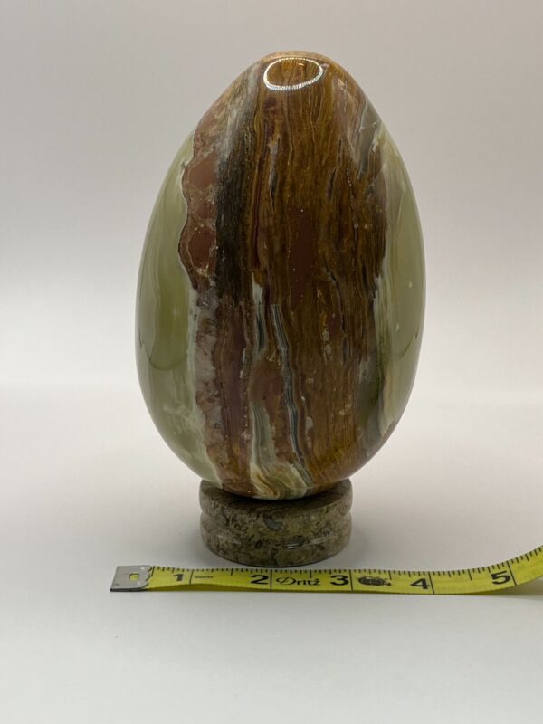 Green and brown banded onyx egg.