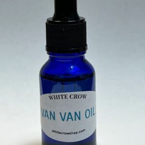 Blue bottle of White Crow Van Van Oil.