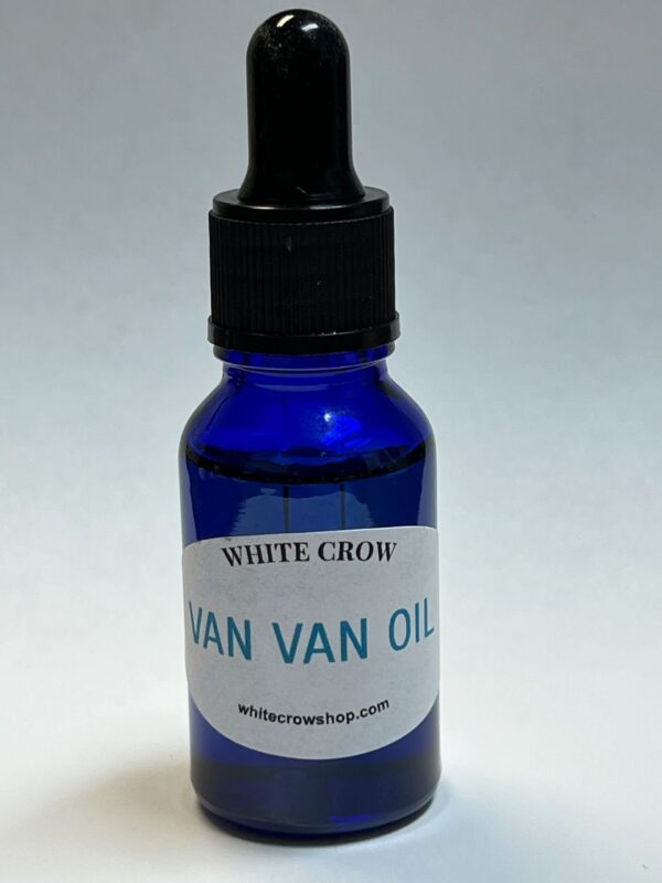 Blue bottle of White Crow Van Van Oil.