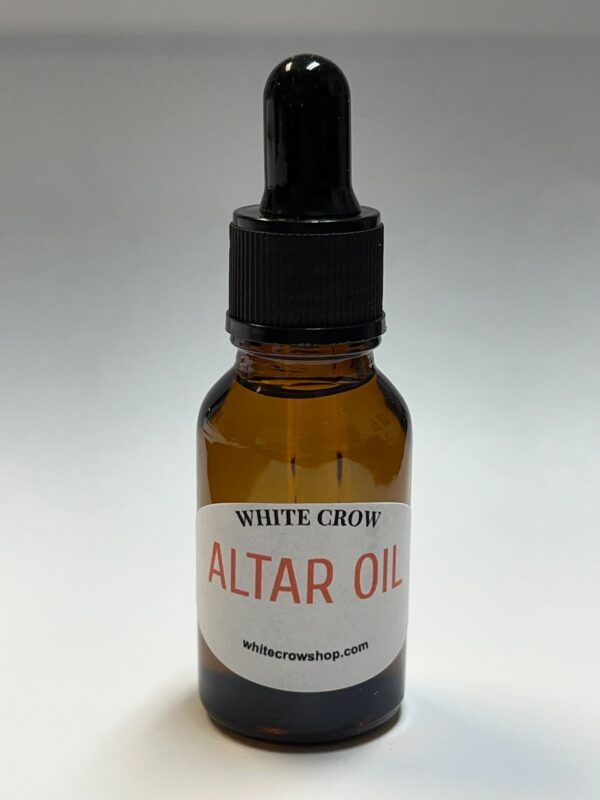 Brown glass bottle of altar oil.