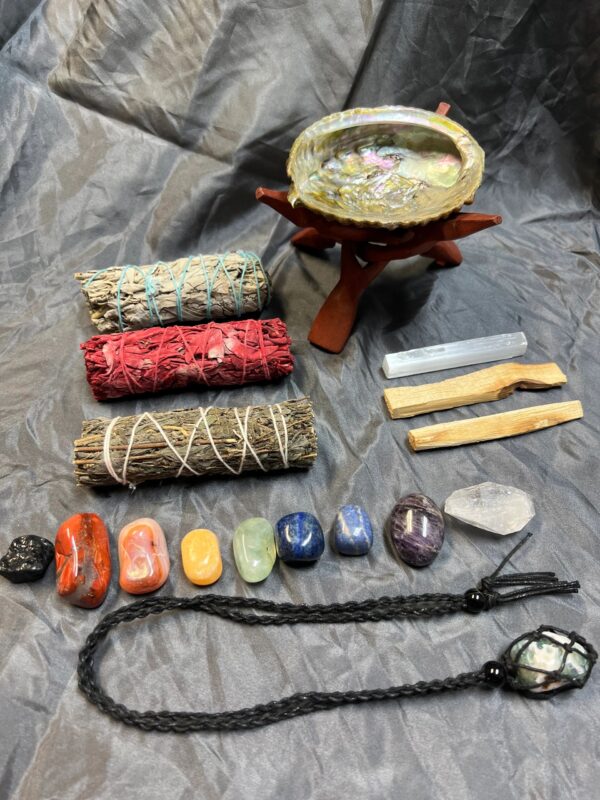 Smudging kit with crystals and abalone shell.