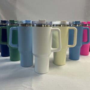 Colorful travel mugs with handles.