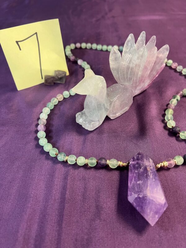 Fluorite fox and amethyst pendant necklace.