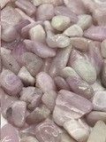 Pink and white tumbled gemstone chips.