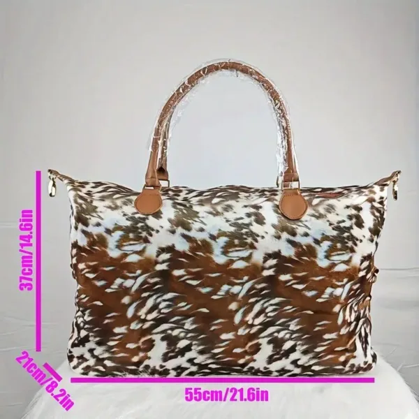 Brown and white animal print travel bag.