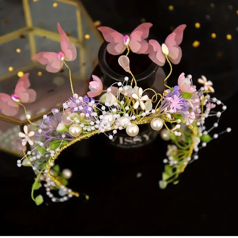 Floral crown with butterflies and pearls.