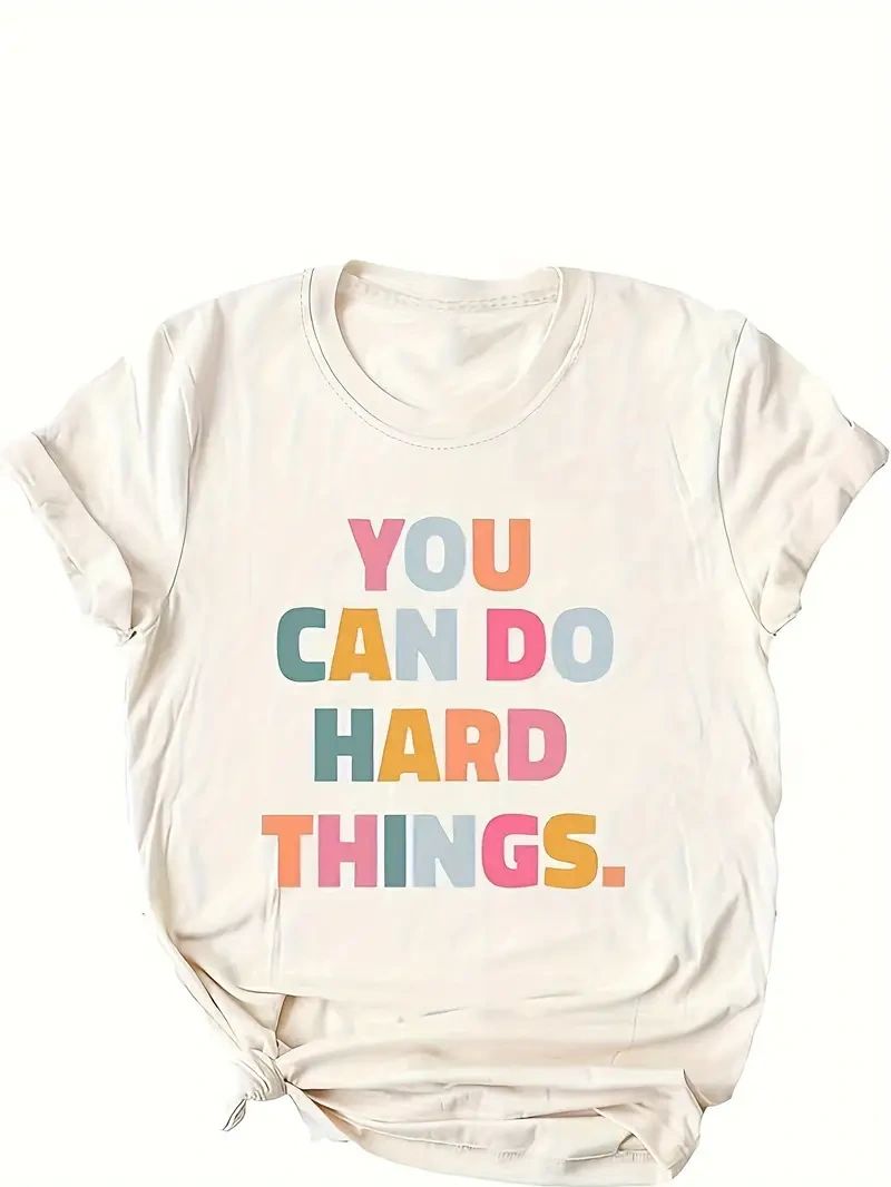 White t-shirt with "You can do hard things" in rainbow colors.