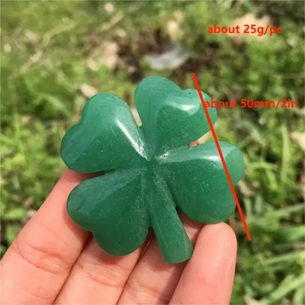 Green four-leaf clover gemstone pendant.