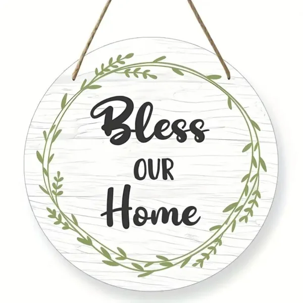 Round wooden sign with "Bless Our Home" and greenery.