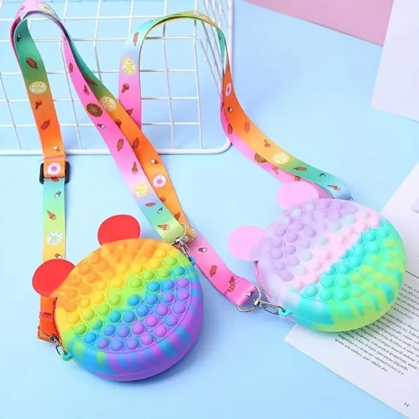 Rainbow pop it purse with strap.