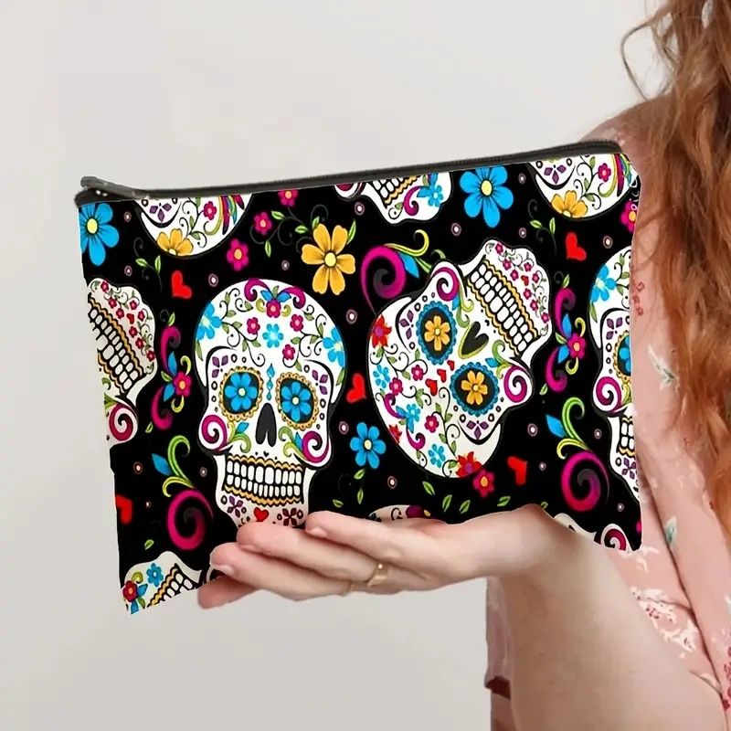 Black and white skull makeup bag with colorful flowers.