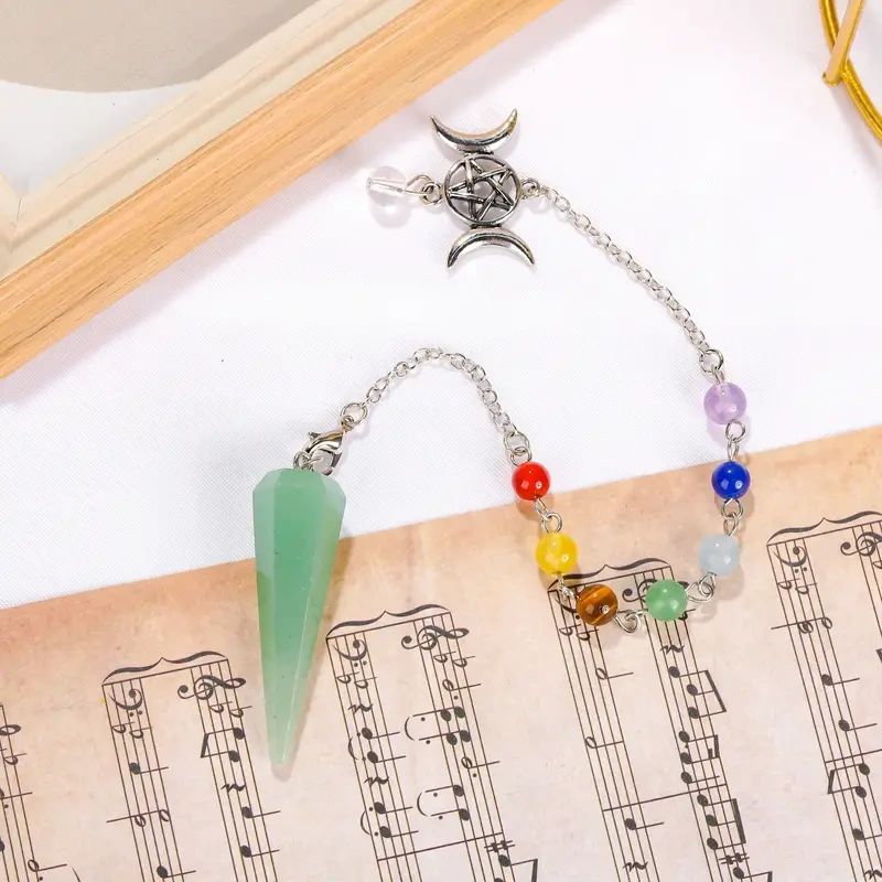 Green crystal pendulum with chakra beads.