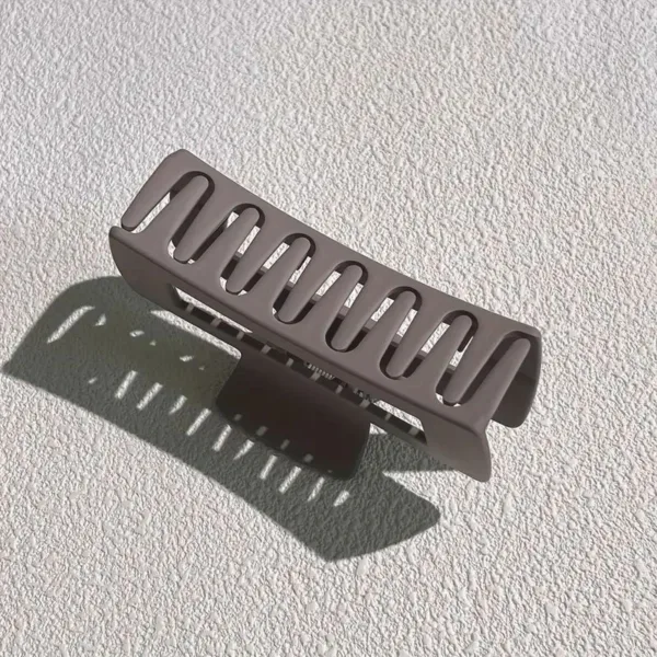 Gray plastic hair claw clip.