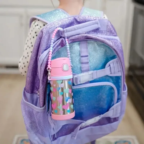 Purple glitter backpack with a pink water bottle.