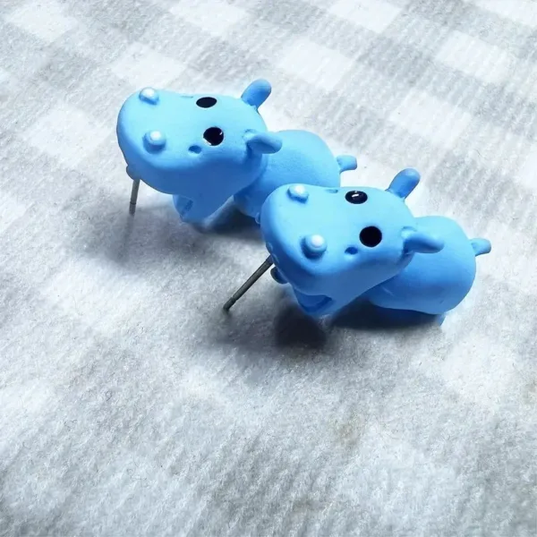 Blue hippopotamus stud earrings.