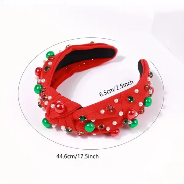 Red jeweled headband with pearls.