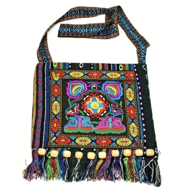 Colorful embroidered handbag with fringe.