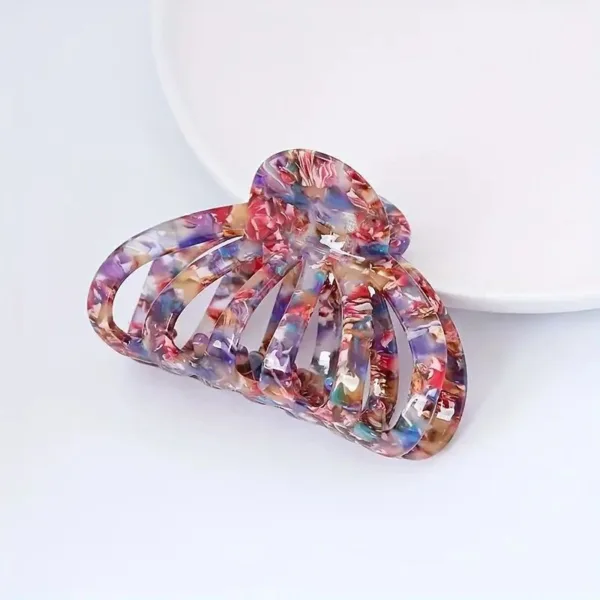 Colorful plastic hair claw clip.