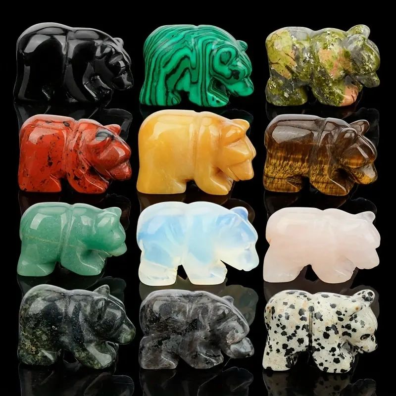 Twelve carved gemstone bear figurines.