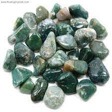 A collection of green moss agate stones.