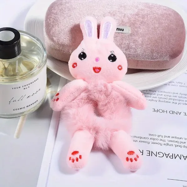 Pink fuzzy bunny plush keychain.