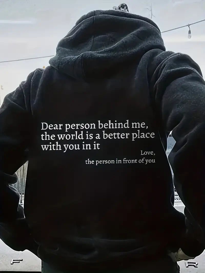 Black hoodie with inspirational quote.