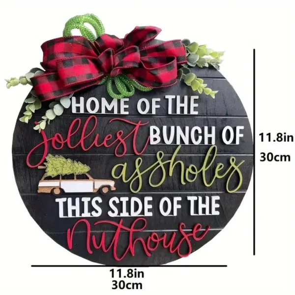 Black round sign with holiday message.