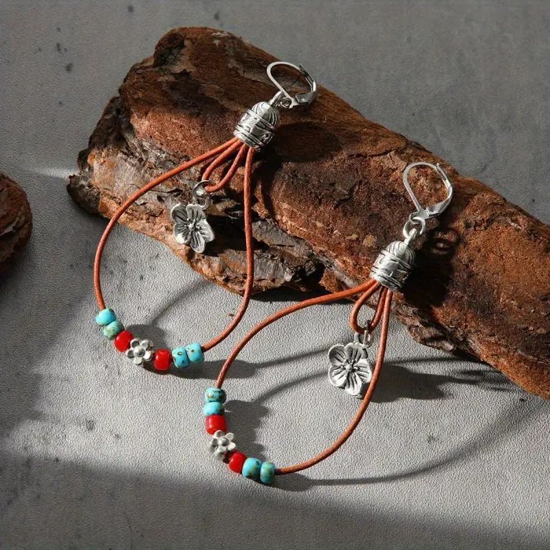 Boho dangle earrings with turquoise beads.